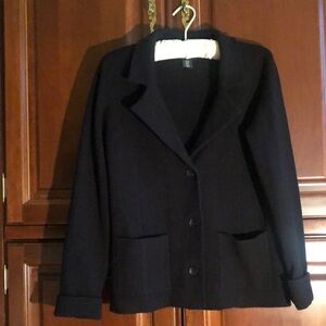 Knit black blazer with patch pockets & a 3 button closure , rolled cuffs